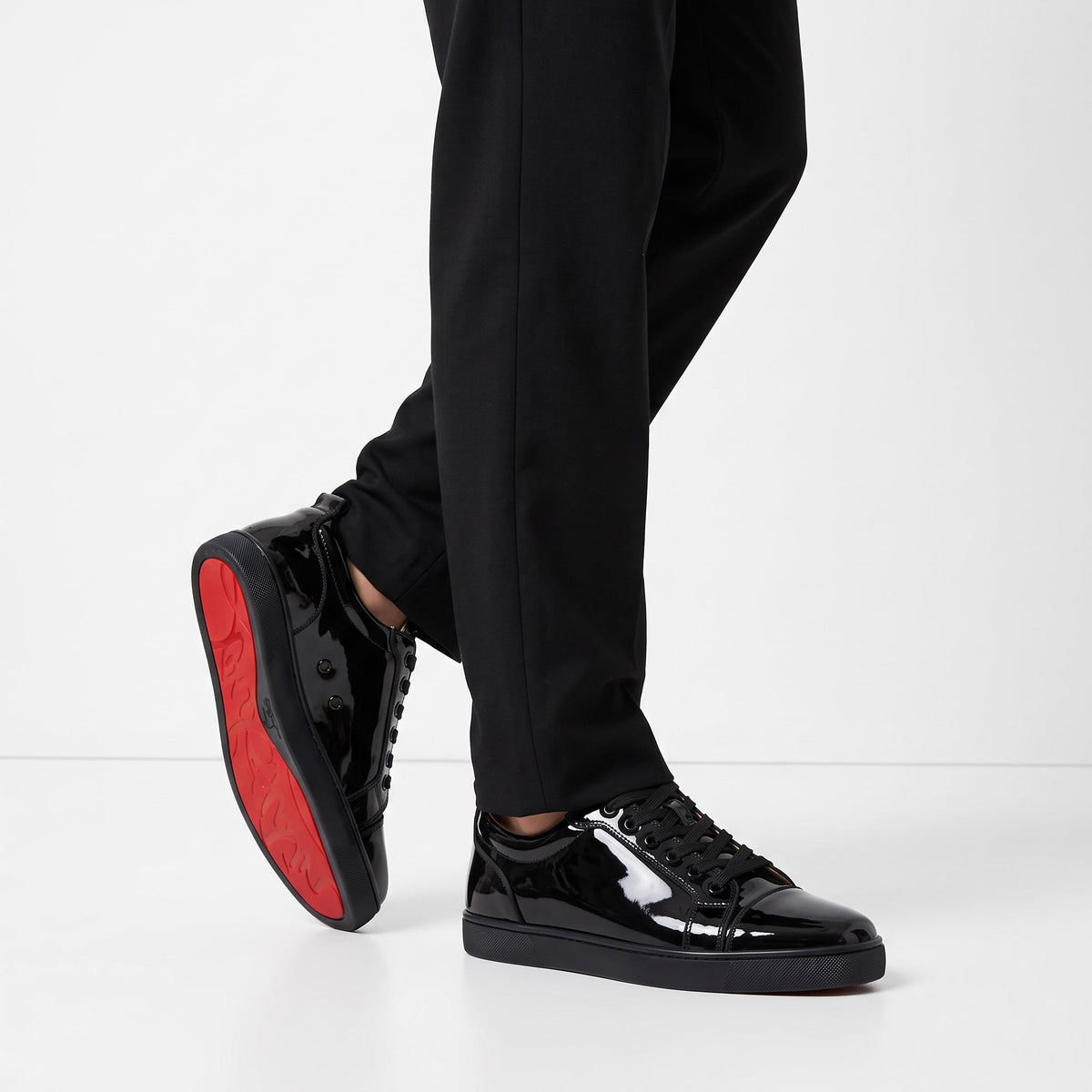 Christian Louboutin Patent Sneaker β Black & Red