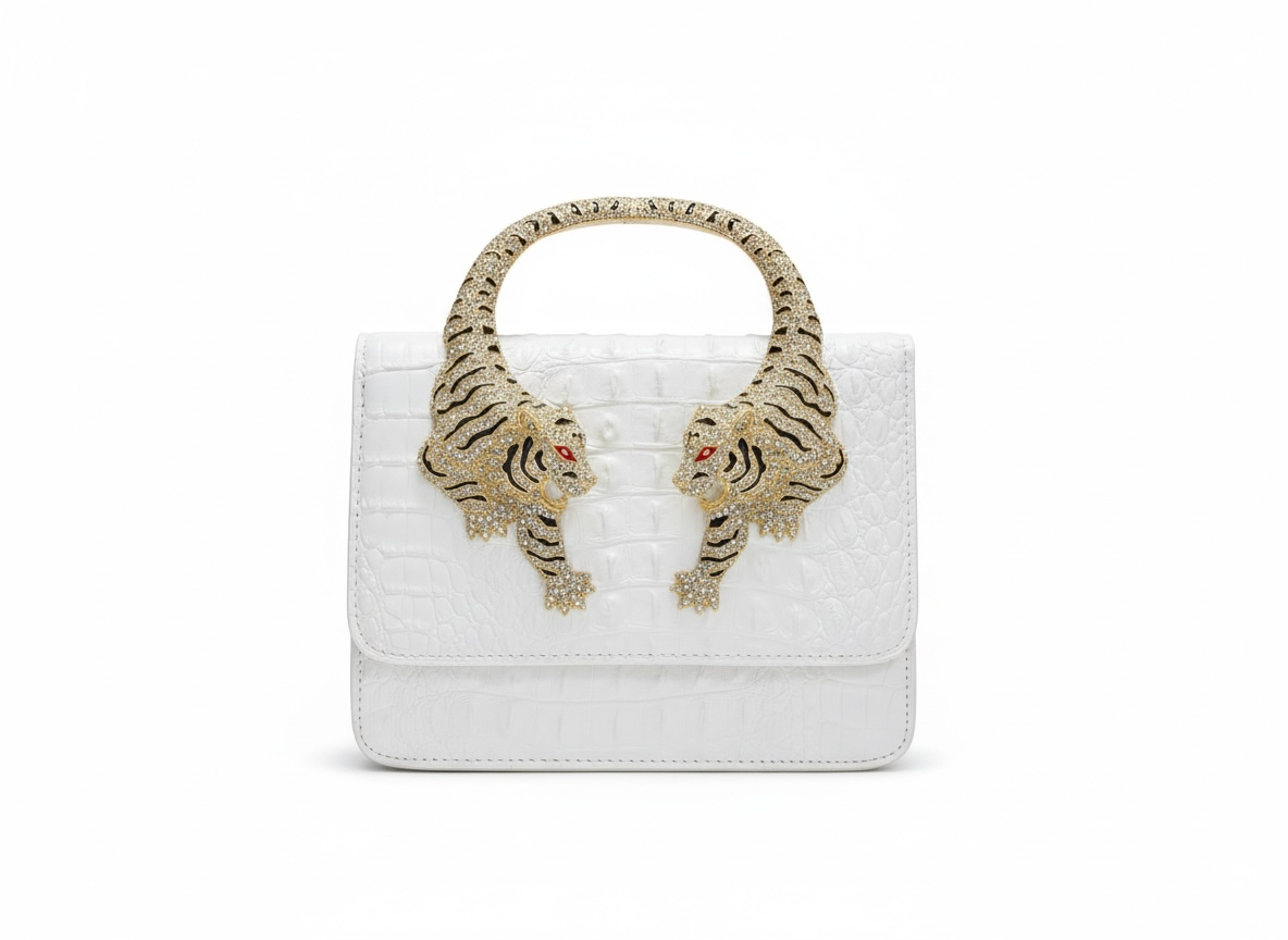ROBERTO CAVALLI Tiger Handle Bag β White Gold π
β¨ | Statement Luxury Piece