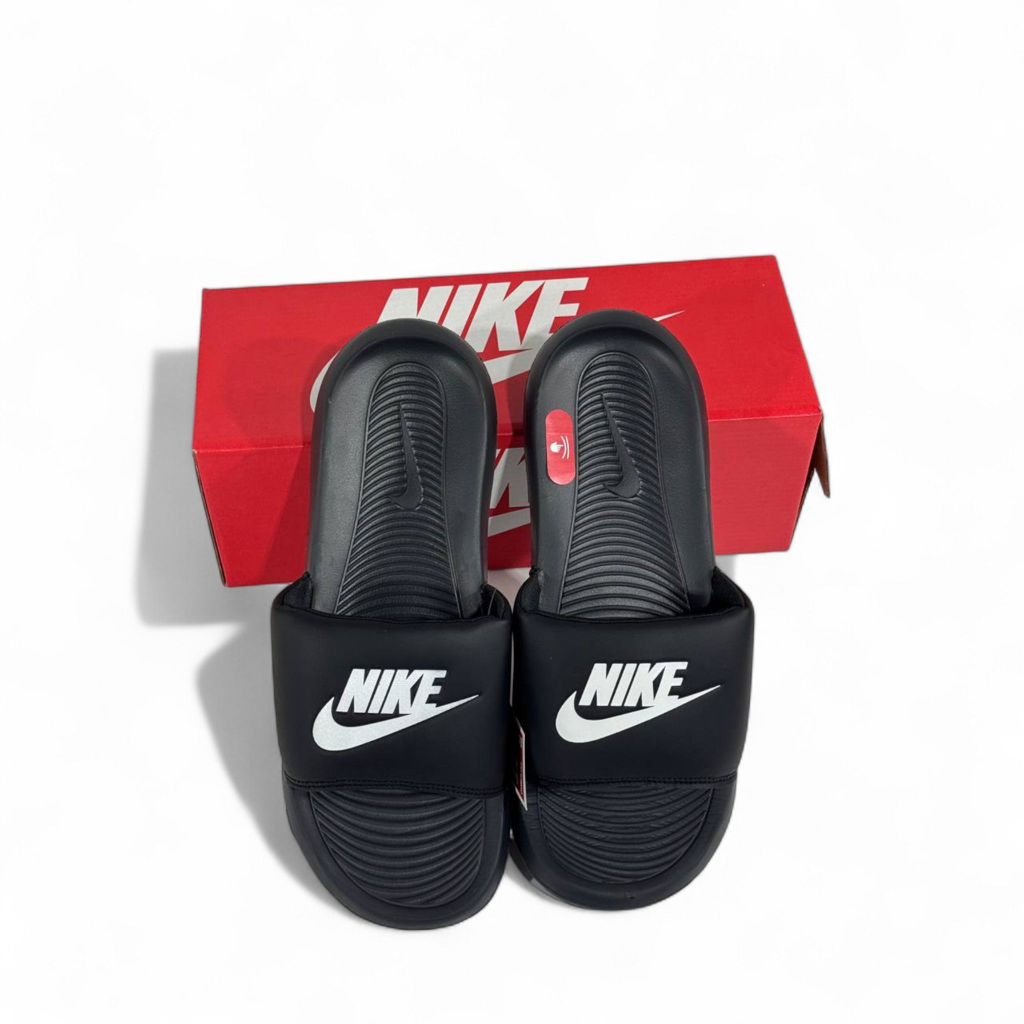 ⚫⚪ Nike Black Slides with White Swoosh – Classic Everyday Slippers ✔️