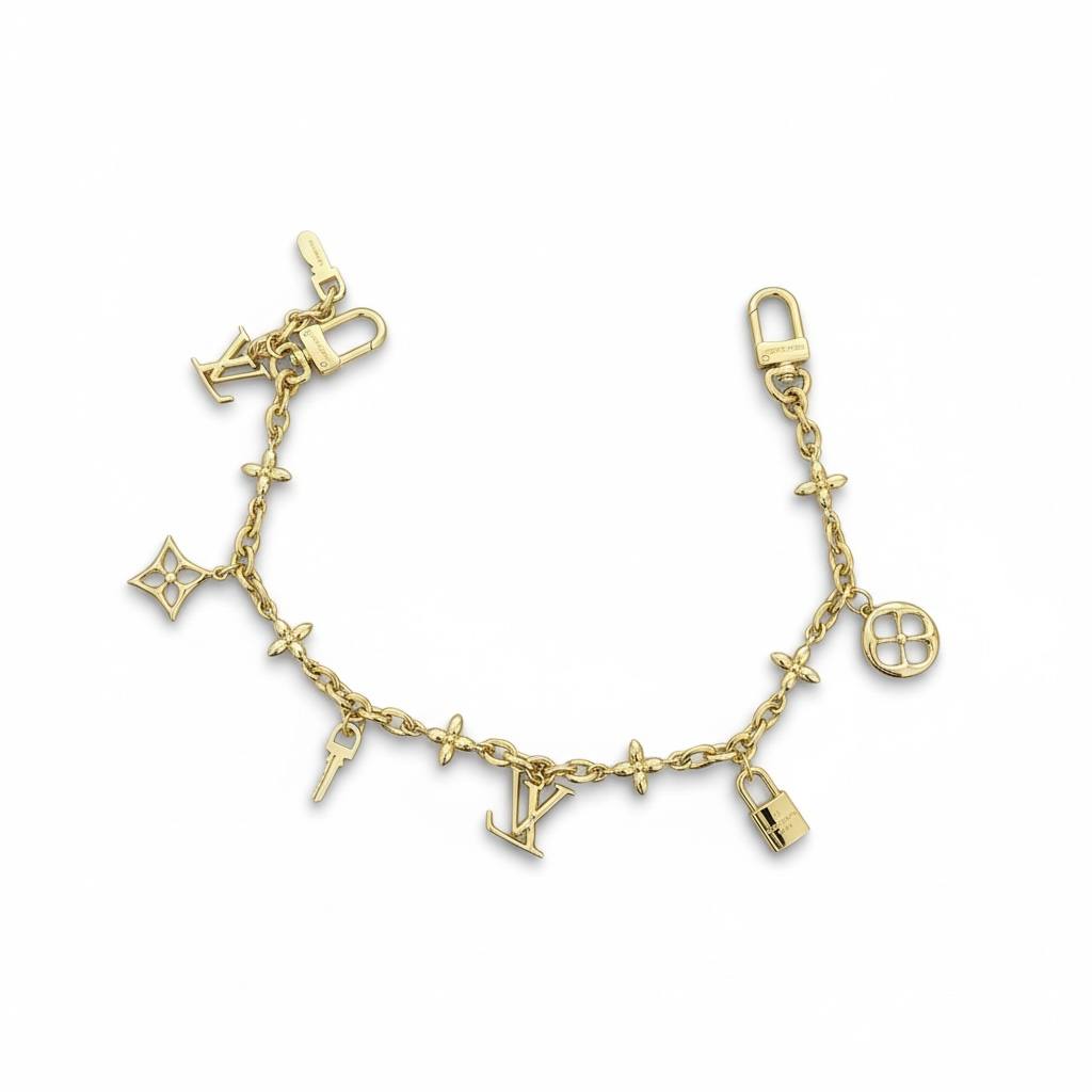 Louis Vuitton Gold Bag Charm β Iconic LV Monogram Accessory β¨π