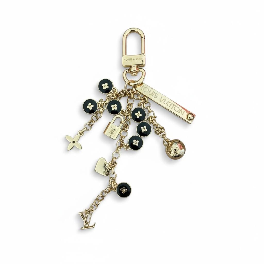 Louis Vuitton Gold & Black key chain – Monogram Icon Luxury Accessory ✨🖤