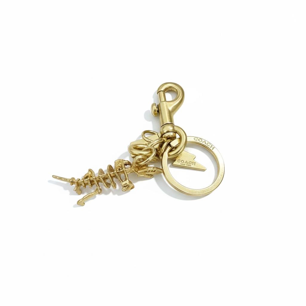 π Coach Rexy Gold Dinosaur Keychain β Iconic Designer Charm