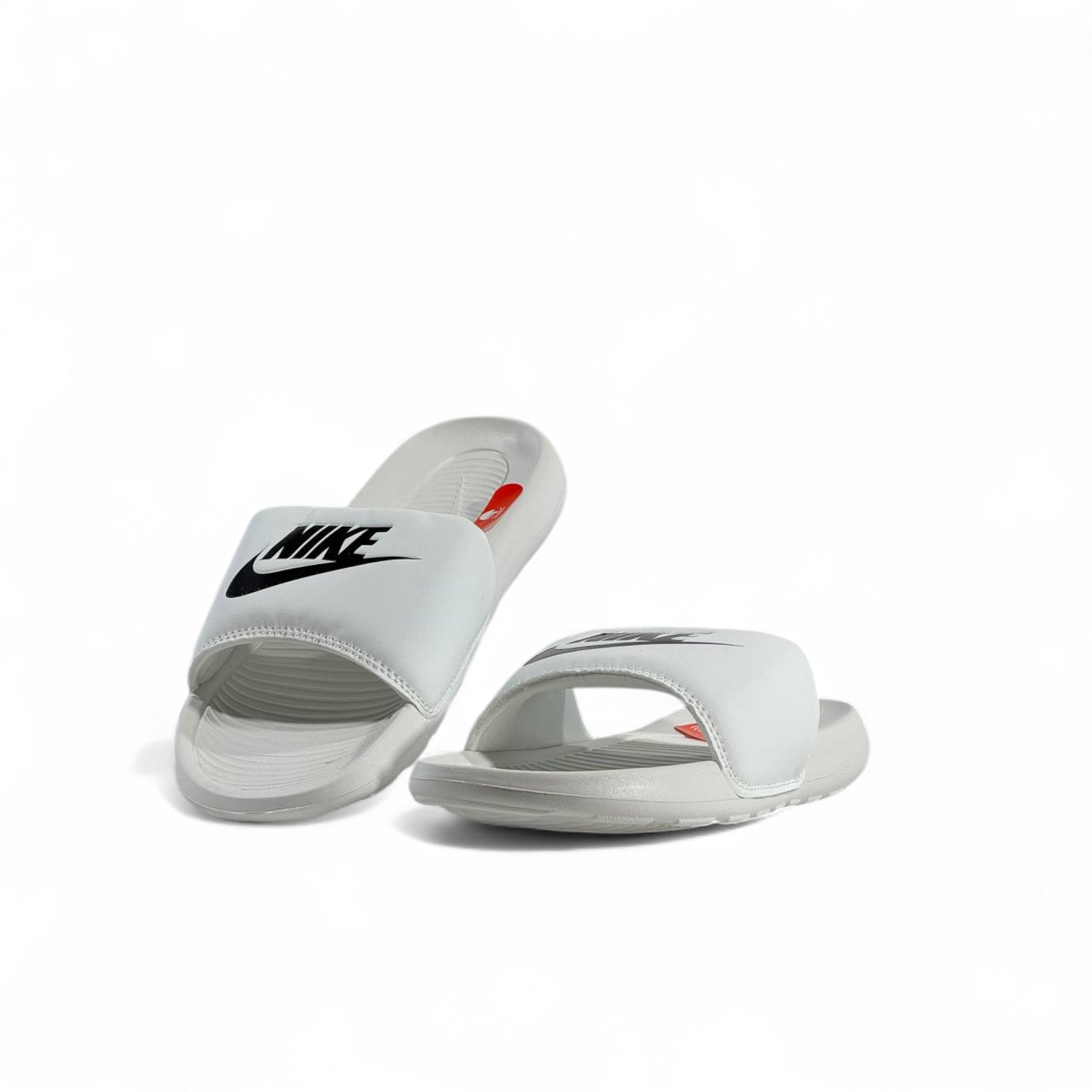 Nike White Slides β Minimalist Comfort with Iconic Style