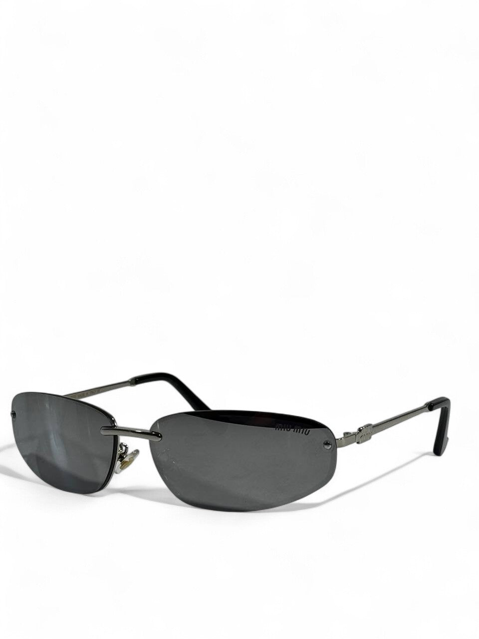 š¤ Miu Miu Rimless Dark Lens Sunglasses ā Bold Elegance Redefined