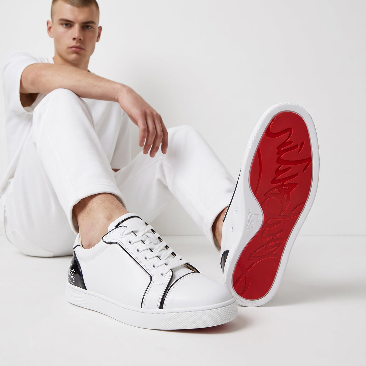 Christian Louboutin Low-Top Sneakers โ White & Black