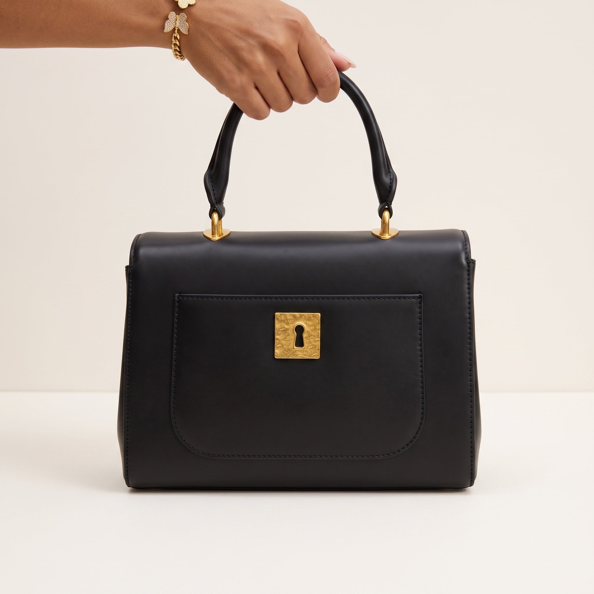 Schiaparelli Top Handle Bag – Black Gold 🖤✨