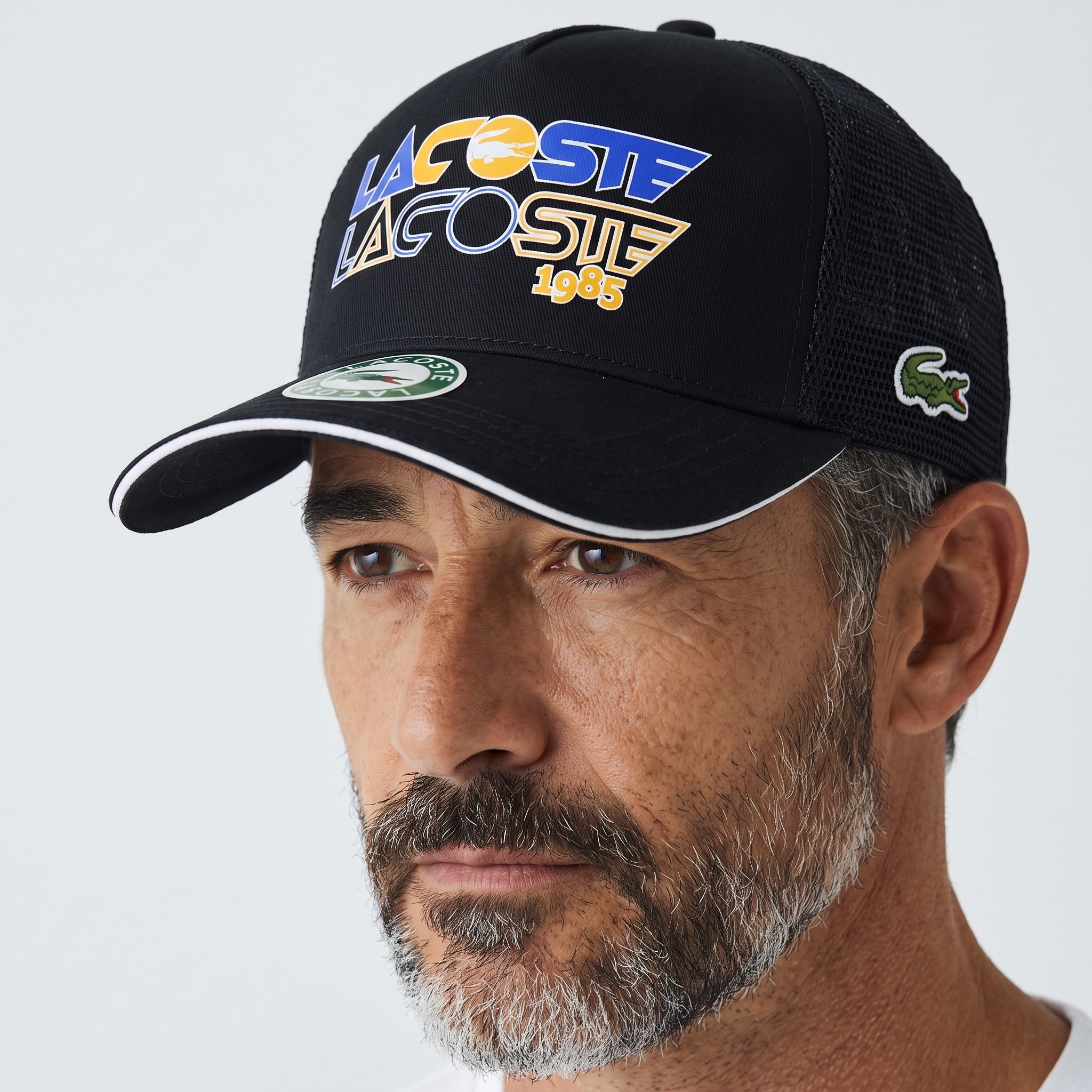 Lacoste 1985 Trucker Cap β Black Mesh Snapback ππ§’