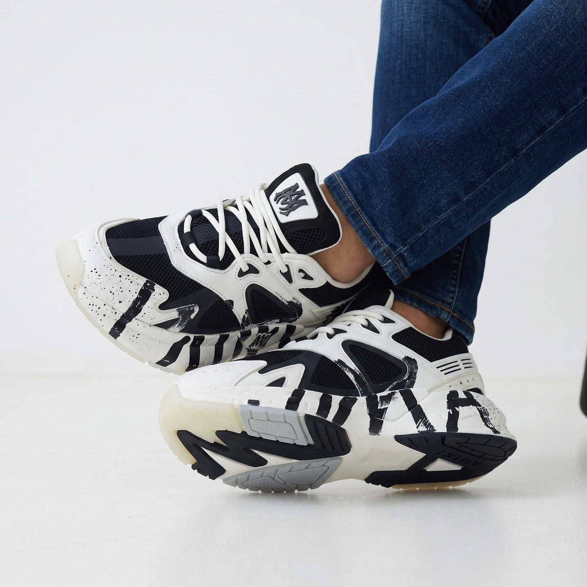 Amiri Chunky Runner β Black & White
