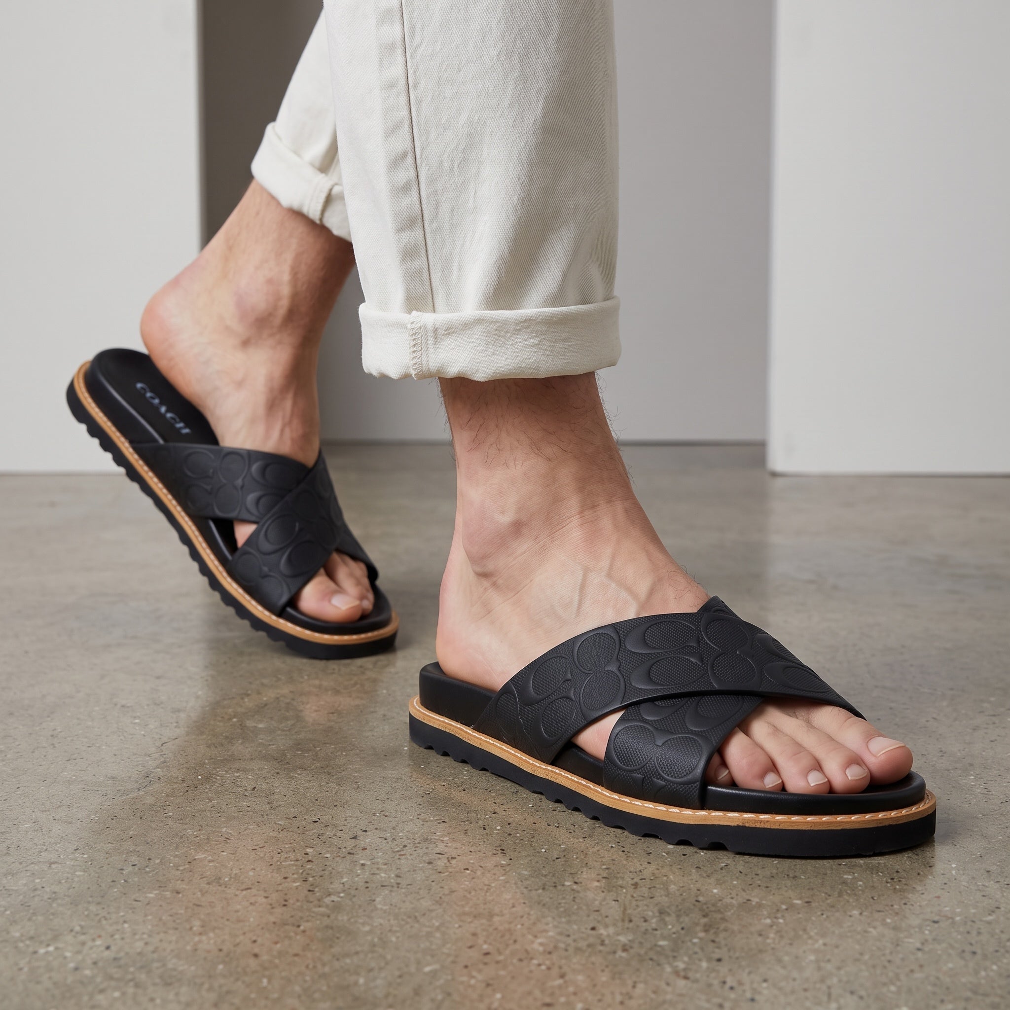 Coach Slide β Black Embossed Logo Sandal π€π©΄