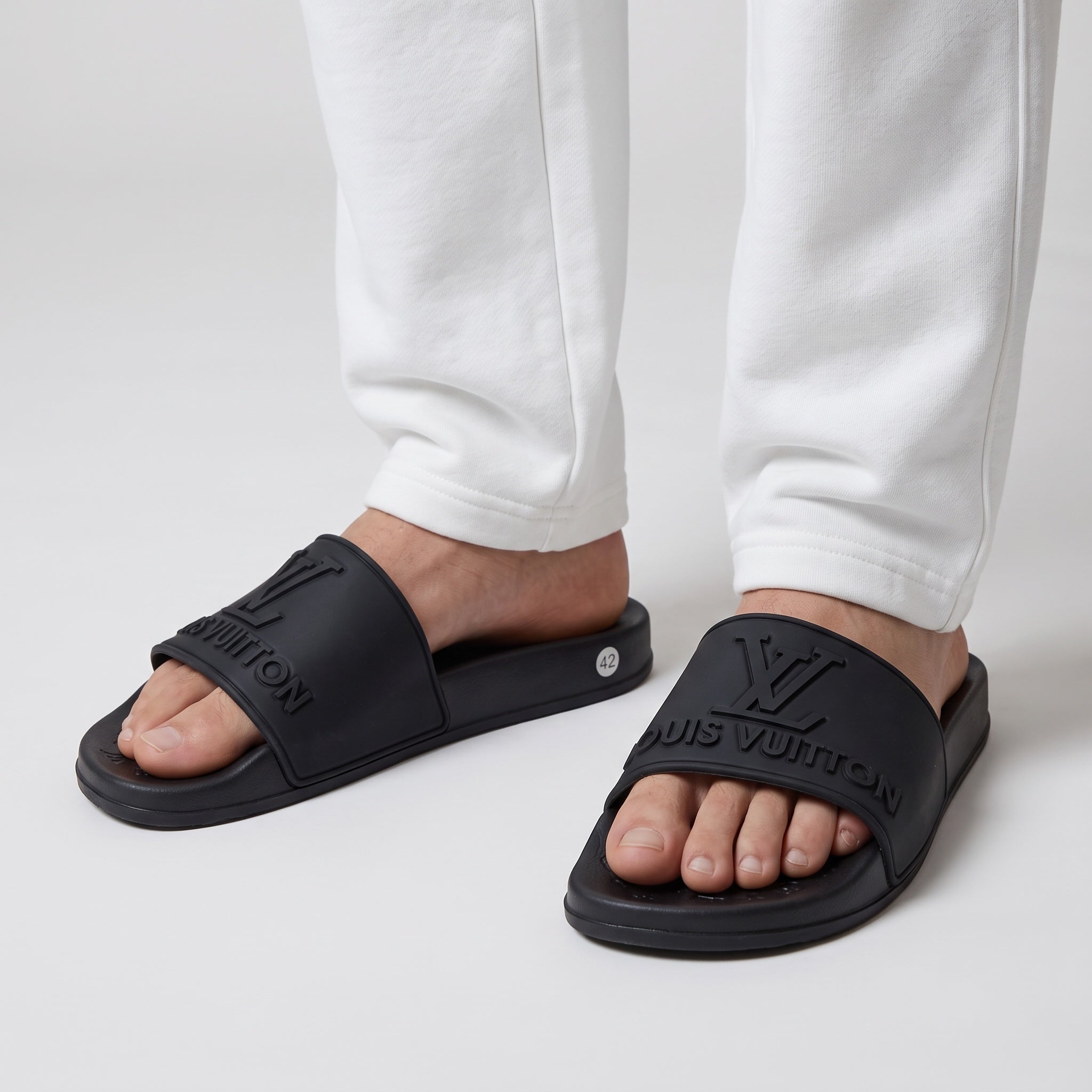 Louis Vuitton Slides – Black Embossed Logo 🖤🩴