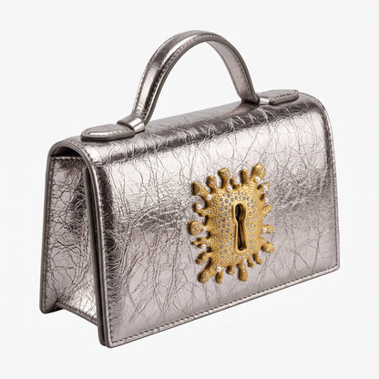Schiaparelli Keyhole Top-Handle Bag — Metallic Silver