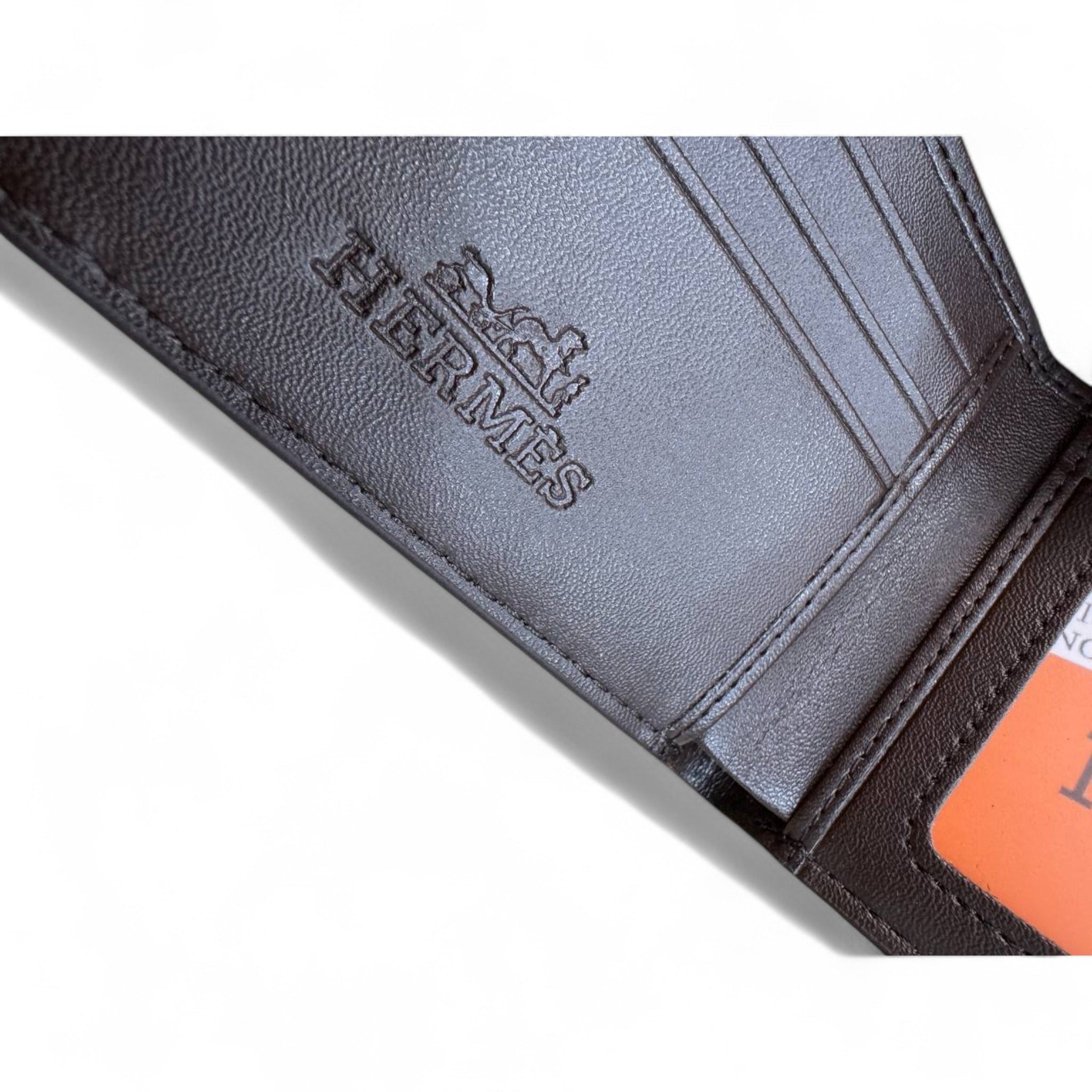 Sophisticated Brown Hermès Wallet with Ostrich Leather Texture