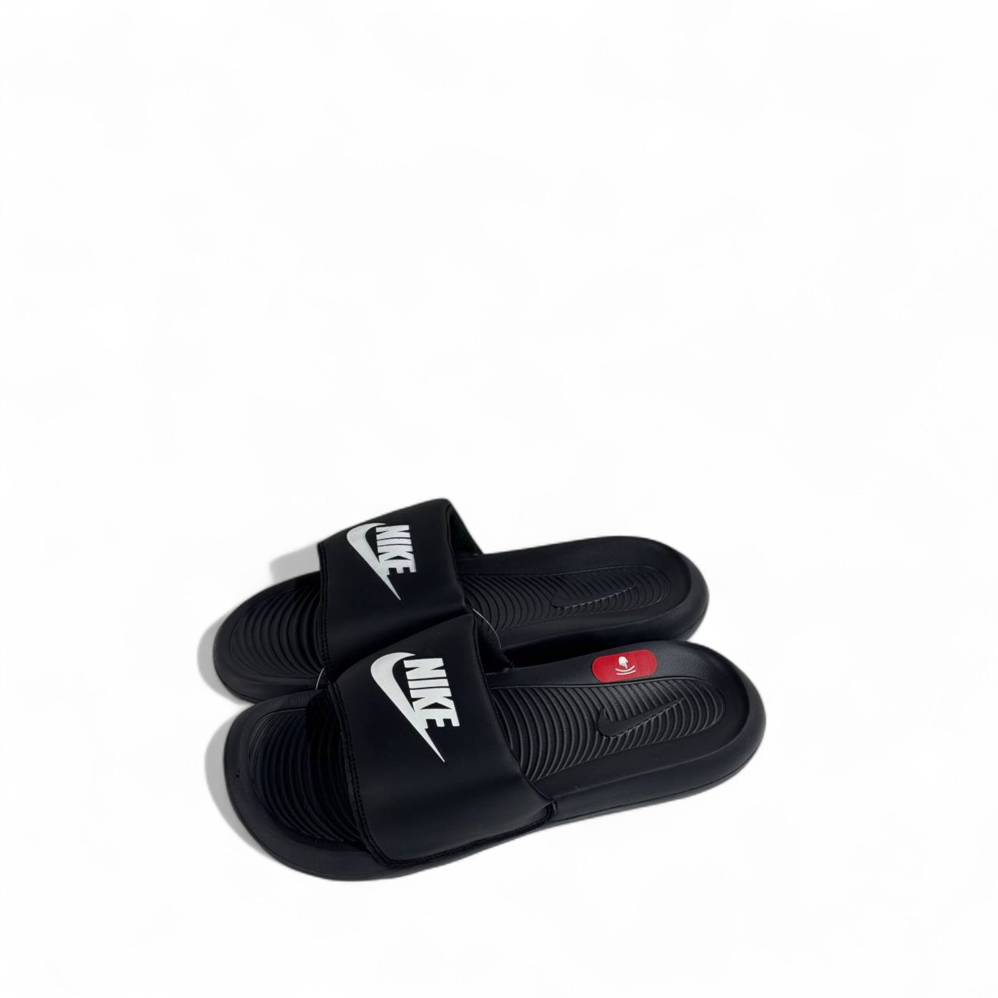 ⚫⚪ Nike Black Slides with White Swoosh – Classic Everyday Slippers ✔️