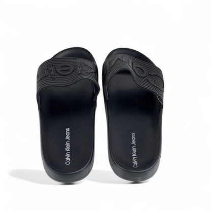 Calvin Klein Jeans Triple Black Slides – Minimalist Comfort & Modern Style