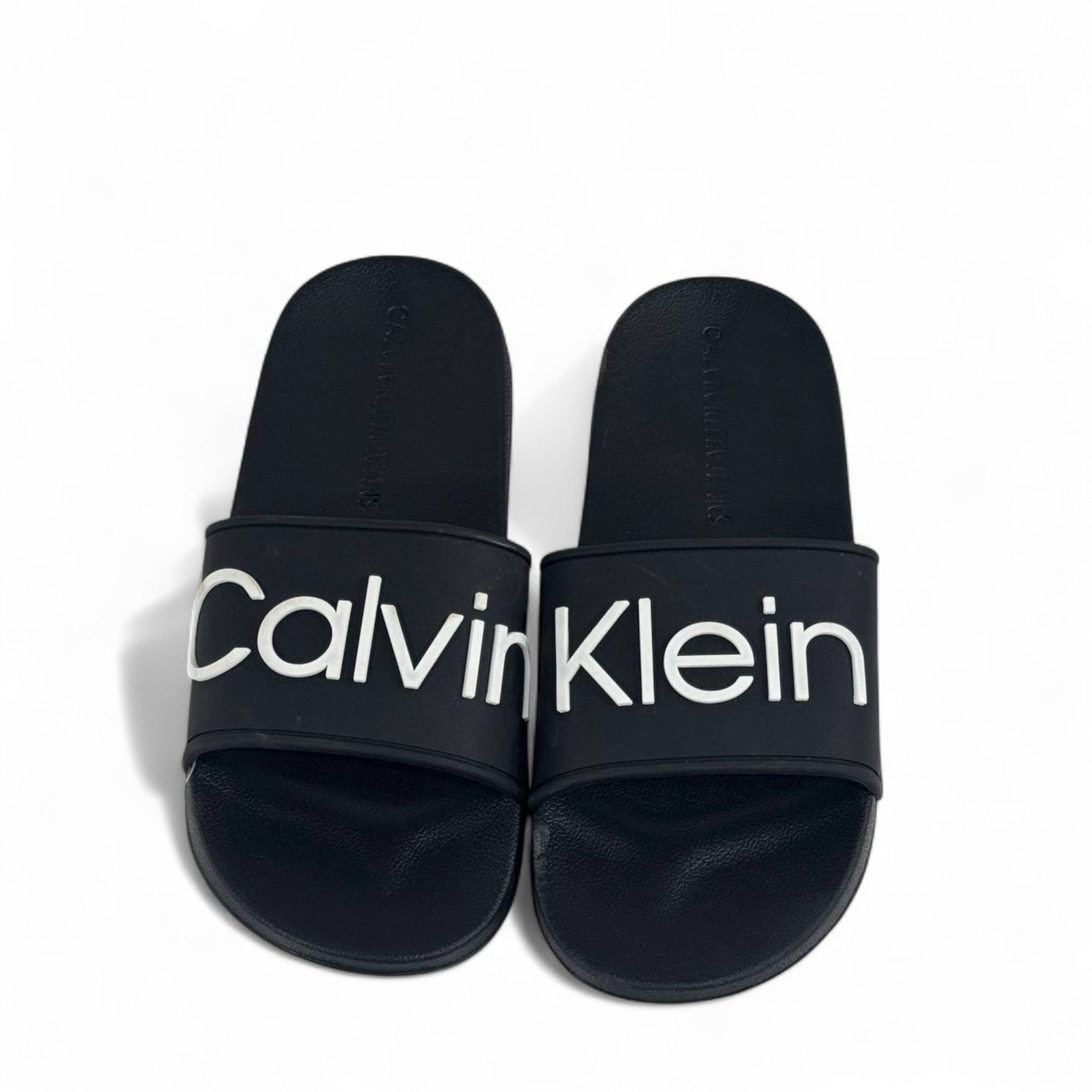 ⚫ Calvin Klein Black Slides – Oversized White Logo Slippers 🤍