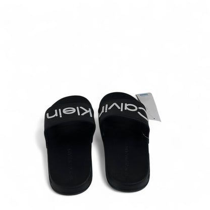 ⚫ Calvin Klein Black Slides – Oversized White Logo Slippers 🤍