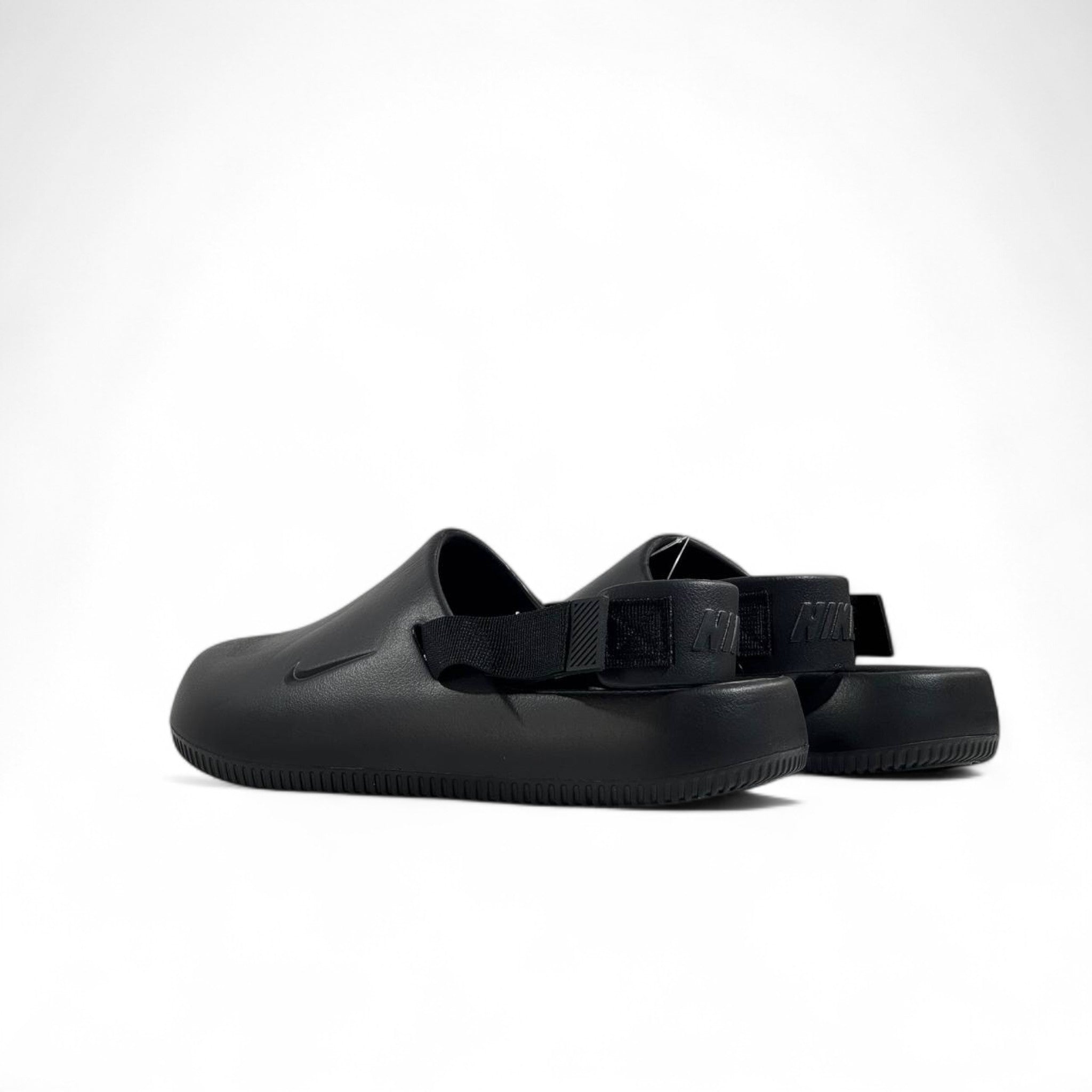 Nike Black Leather Clogs – Minimalist Comfort