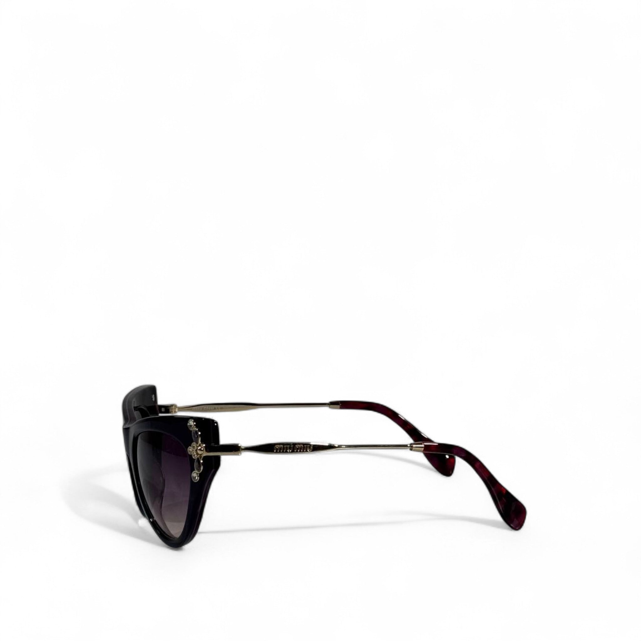 ✨ Miu Miu Cat-Eye Sunglasses – Black Frame with Gold Crystal Detailing 👑💎