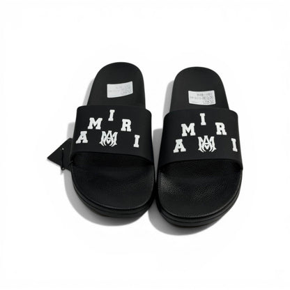 AMIRI Luxury Black Slide Sandals – Bold White Logo Design & Premium Streetwear 👟✨