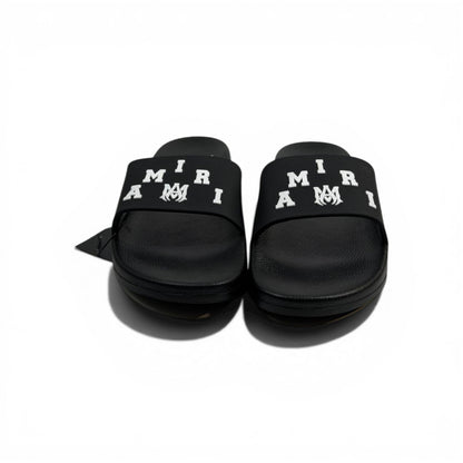 AMIRI Luxury Black Slide Sandals – Bold White Logo Design & Premium Streetwear 👟✨