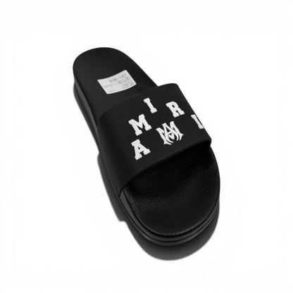 AMIRI Luxury Black Slide Sandals – Bold White Logo Design & Premium Streetwear 👟✨