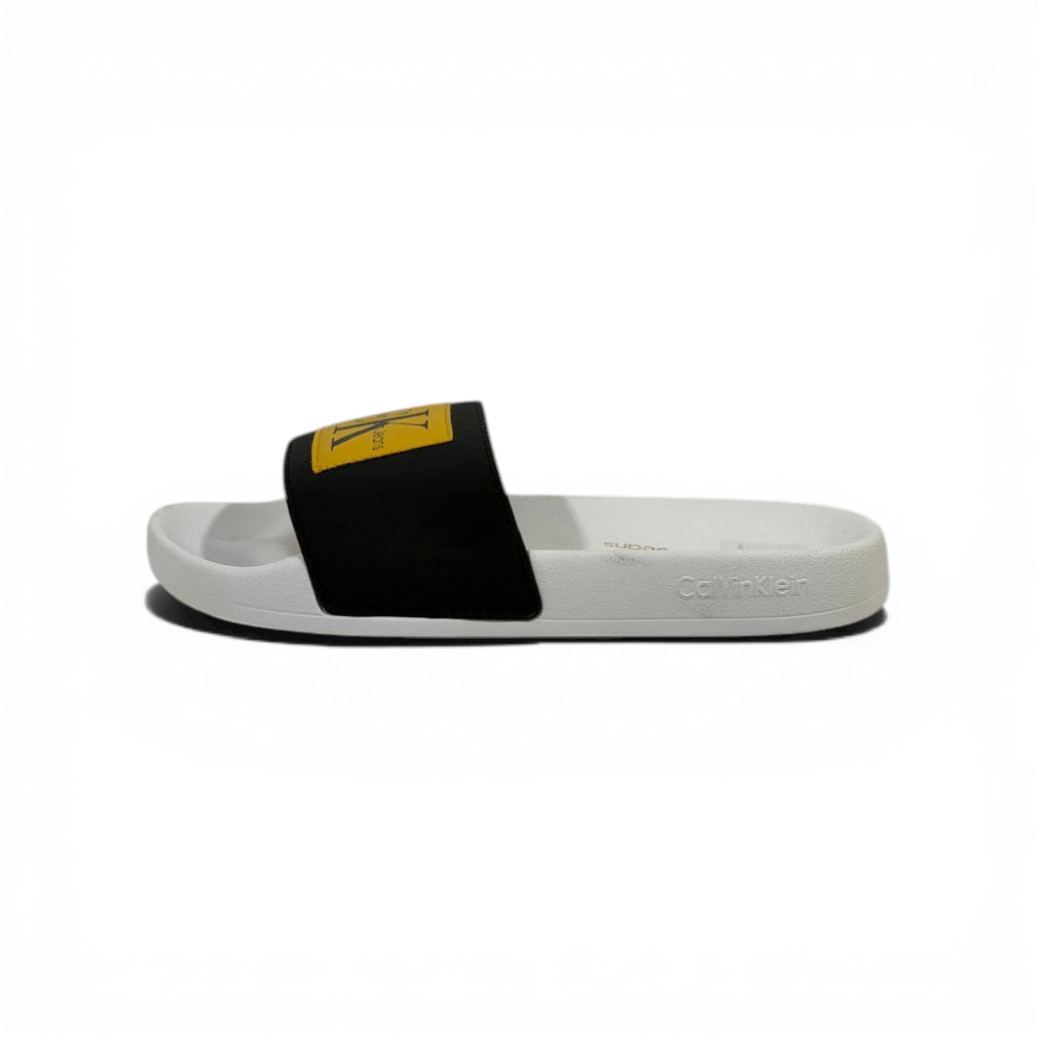 CALVIN KLEIN Luxury Black & White Slide Sandals – Yellow CK Logo Patch & Modern Street Style 👟✨