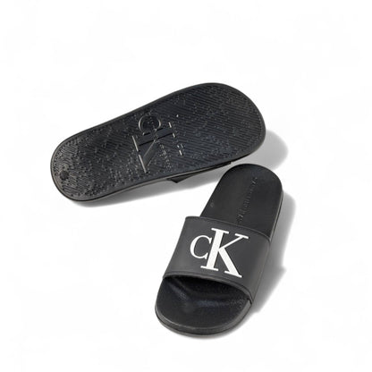 Calvin Klein CK Logo Slides – Black | Bold Minimalist Style 🖤👣🔥