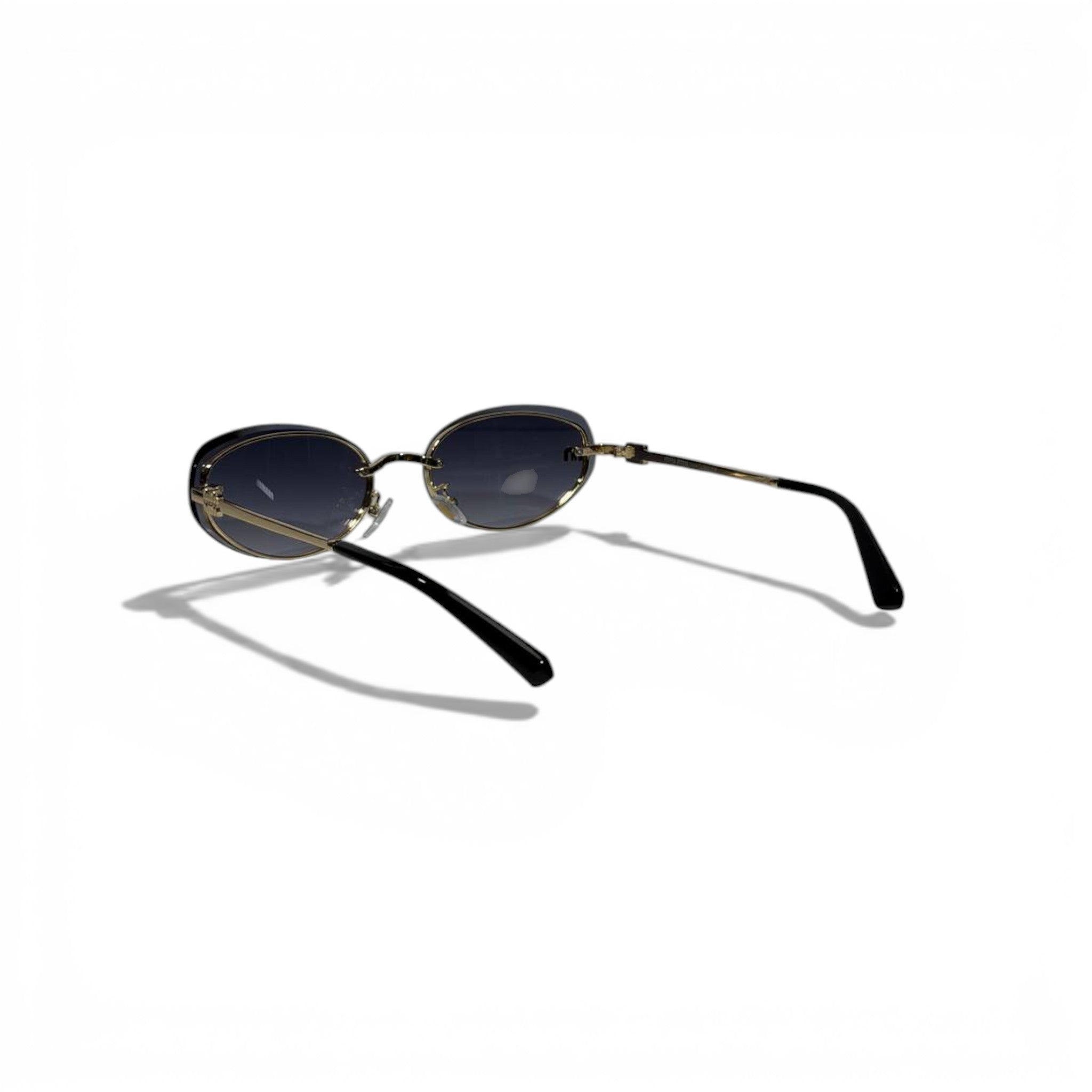 MIU MIU Oval Sunglasses – Gold Metal Frame with Dark Lenses