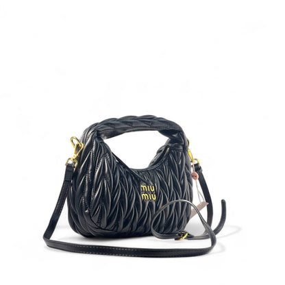 Miu Miu Black Quilted Mini Bag – Bold & Timeless 🖤✨