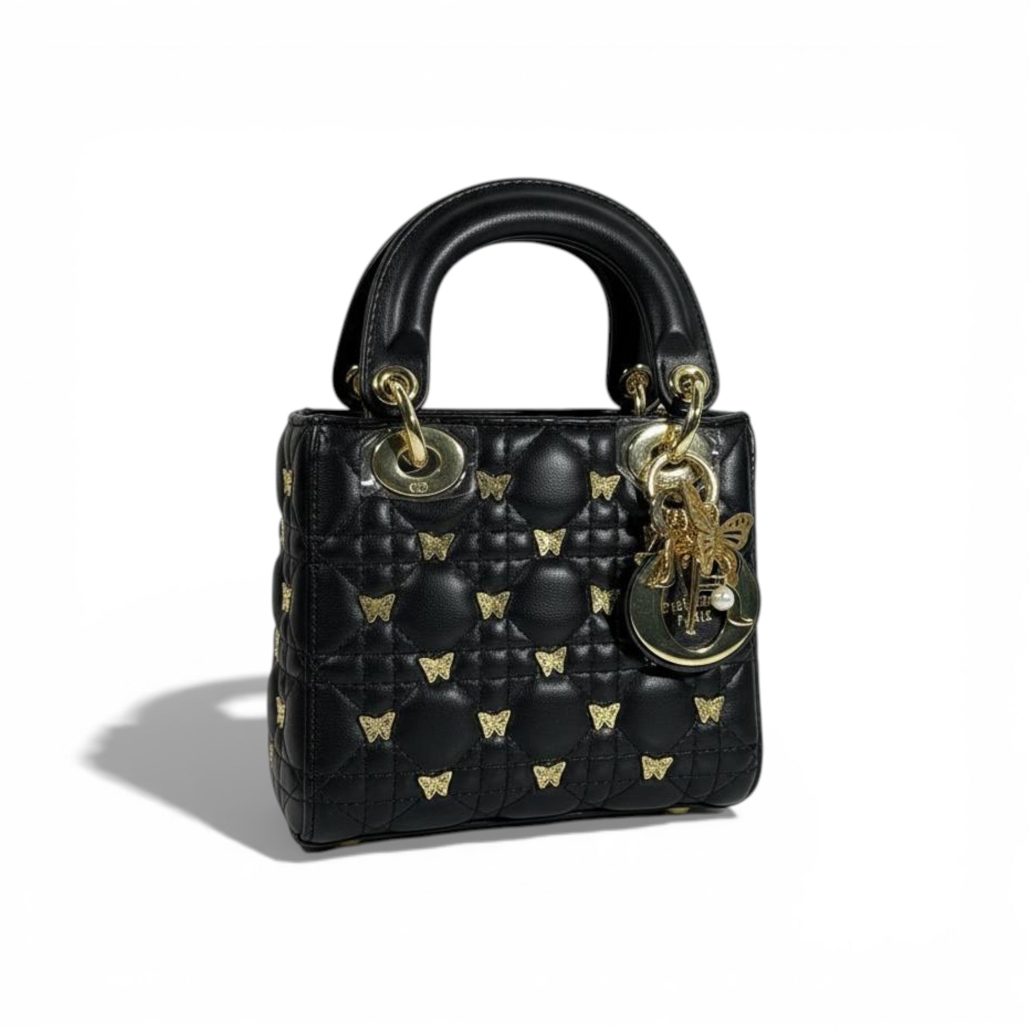 👜 Dior Black Quilted Mini Top-Handle Bag with Gold Butterfly Details 🖤✨