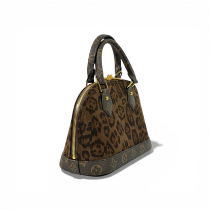 👜 Louis Vuitton Leopard Alma Handbag – Monogram Trim ✨