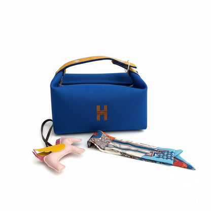 👜💙 Hermès Mini Top-Handle Bag with Scarf & Charm – Blue