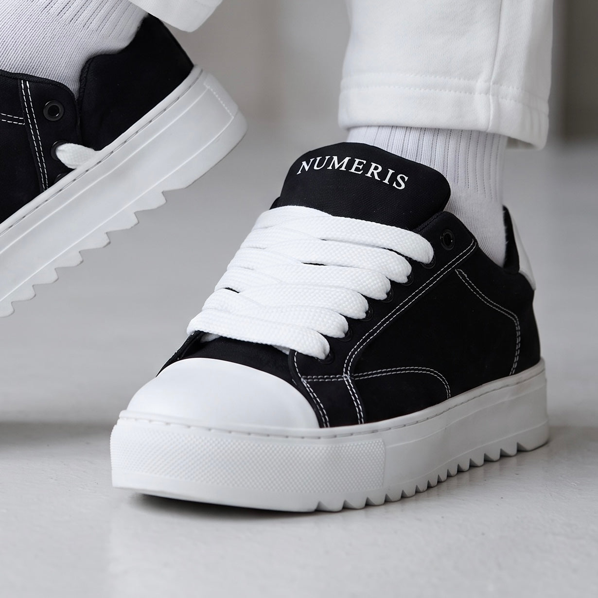 Numeris Low-Top Sneaker – Black & White 🖤🤍