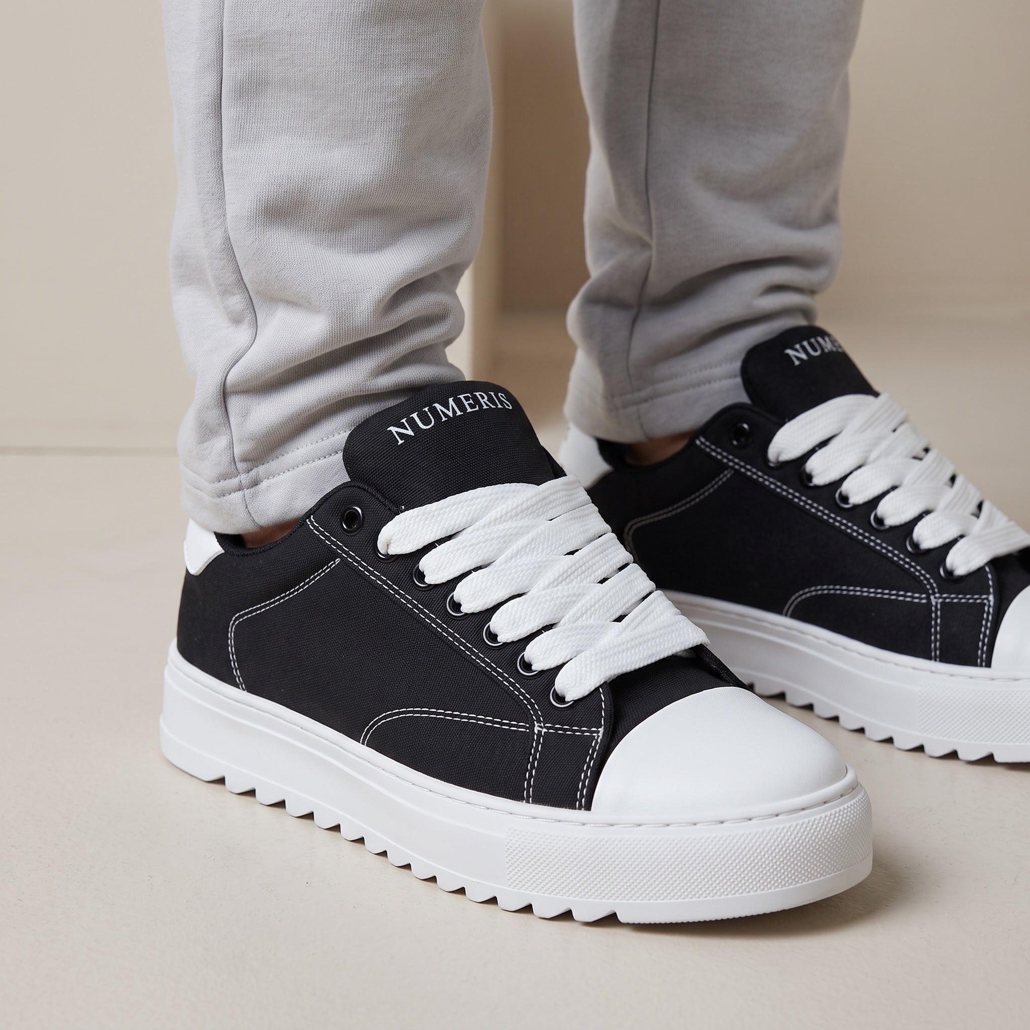 Numeris Low-Top Sneaker – Black & White 🖤🤍
