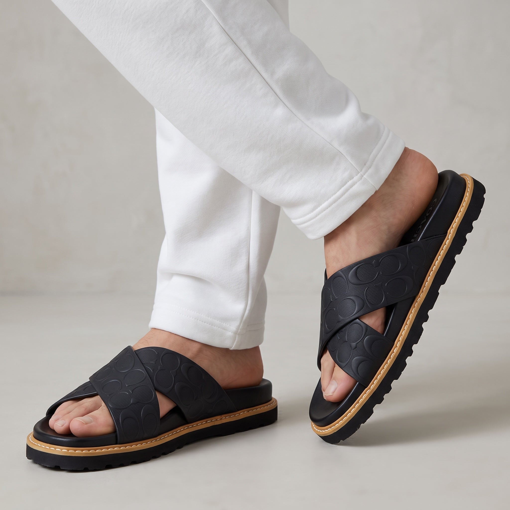 Coach Slide – Black Embossed Logo Sandal 🖤🩴