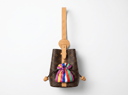 Louis Vuitton Monogram Bucket Bag with Silk Bow Charm