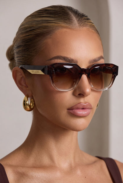 Prada Eyewear Sunglasses – Tortoise Brown 🕶️