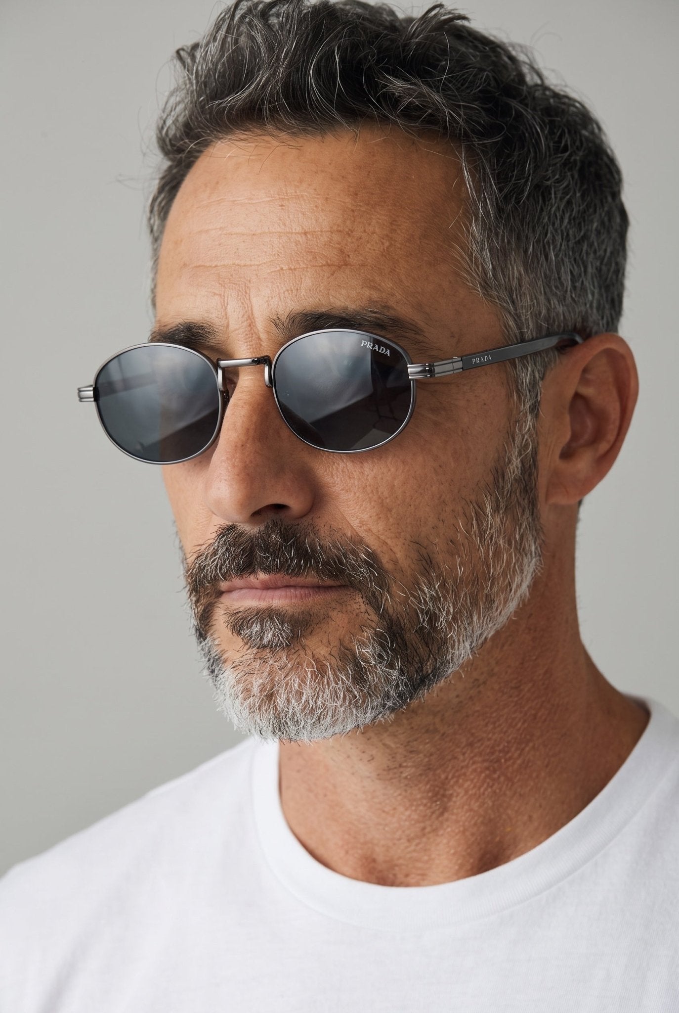 Prada Round Sunglasses – Gunmetal Frame Dark Lenses 🕶️